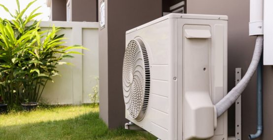 Air conditioner compressor outdoor — Electricians in Warana QLD