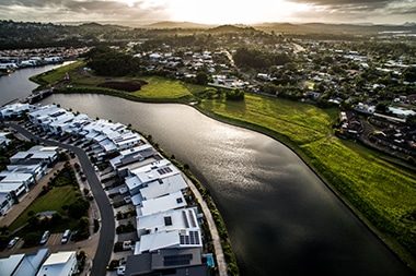 Aerial view looking towards the sunset over Buderim from Maroochydore on the Sunshine Coast