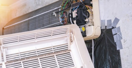 Mold and dust on the air conditioner body — Electricians in Warana QLD